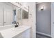 Modern bathroom vanity with a sleek countertop and elegant black fixtures at 3151 Soaring Gulls Dr # 1145, Las Vegas, NV 89128