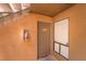 Exterior entrance to unit features a modern front door and stucco siding at 3151 Soaring Gulls Dr # 1145, Las Vegas, NV 89128