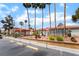 Exterior of a building with palm trees and a covered entrance on a sunny day at 3151 Soaring Gulls Dr # 1145, Las Vegas, NV 89128