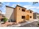 View of stucco exterior with desert landscaping and walkway at 3151 Soaring Gulls Dr # 1145, Las Vegas, NV 89128
