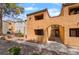 Exterior view features a well-maintained walkway and desert landscaping at 3151 Soaring Gulls Dr # 1145, Las Vegas, NV 89128
