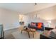Cozy living room with a view into the dining area, modern furniture, and neutral color palette throughout at 3151 Soaring Gulls Dr # 1145, Las Vegas, NV 89128