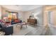 Open living area features modern furniture, neutral decor, and plenty of natural light from the sliding glass door at 3151 Soaring Gulls Dr # 1145, Las Vegas, NV 89128