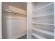 Organized walk-in closet with shelves and hanging rod, offering ample storage space at 3151 Soaring Gulls Dr # 1145, Las Vegas, NV 89128