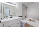 Bathroom featuring a tub, white vanity with a large mirror, and contemporary fixtures at 3151 Soaring Gulls Dr # 1168, Las Vegas, NV 89128