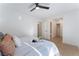 Bright bedroom with tile flooring, ceiling fan and doorway to bathroom and closet at 3151 Soaring Gulls Dr # 1168, Las Vegas, NV 89128