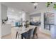 Open floor plan featuring dining area with views to the living room and kitchen at 3151 Soaring Gulls Dr # 1168, Las Vegas, NV 89128