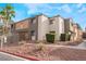 Apartment exterior showcasing tidy landscaping and a gated entrance at 3151 Soaring Gulls Dr # 1168, Las Vegas, NV 89128