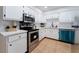Well-lit kitchen featuring stainless steel appliances and ample counter space at 3151 Soaring Gulls Dr # 1168, Las Vegas, NV 89128