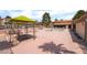 The community pool area boasts a spacious pool, lounge chairs and covered seating at 3151 Soaring Gulls Dr # 1168, Las Vegas, NV 89128