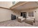 Covered outdoor patio featuring tile flooring and comfortable patio seating at 3636 Gainsville St, Las Vegas, NV 89129