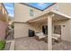 Covered outdoor patio featuring tile flooring and comfortable patio seating at 3636 Gainsville St, Las Vegas, NV 89129