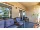Comfortable balcony with outdoor furniture and serene views at 3845 Wiggins Bay St # 202, Las Vegas, NV 89129