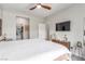 Neutral bedroom featuring a bed, closet, side table and decorative wall art at 3845 Wiggins Bay St # 202, Las Vegas, NV 89129