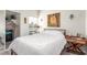 Well-lit bedroom with bed, a window, closet, and elegant decor and furnishings at 3845 Wiggins Bay St # 202, Las Vegas, NV 89129