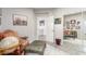 Inviting sitting room featuring an armchair, settee and closet with mirrored doors at 3845 Wiggins Bay St # 202, Las Vegas, NV 89129
