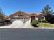 Charming single-story home featuring a three-car garage and well-maintained landscaping at 3882 Genoa Dr, Las Vegas, NV 89141