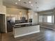 Modern kitchen featuring stainless steel appliances, pendant lighting, and ample counter space at 3882 Genoa Dr, Las Vegas, NV 89141