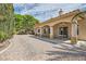 Large backyard with decorative stone and a covered patio at 427 Rhythm St, Henderson, NV 89074