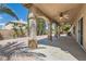 Covered patio with detailed columns and an outdoor ceiling fan at 427 Rhythm St, Henderson, NV 89074