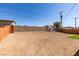 Expansive backyard with block wall, offering ample space for customization at 4360 El Tovar Rd, Las Vegas, NV 89115
