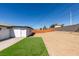 Large backyard with partial block wall and small section of turf at 4360 El Tovar Rd, Las Vegas, NV 89115