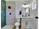 Updated bathroom with shower, stylish vanity, and modern fixtures at 4360 El Tovar Rd, Las Vegas, NV 89115