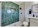 Stylish bathroom featuring a tiled shower with a niche and modern fixtures at 4360 El Tovar Rd, Las Vegas, NV 89115