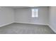 Neutral bedroom with a bright window and plush carpeting at 4360 El Tovar Rd, Las Vegas, NV 89115