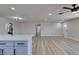 Open-concept living room featuring recessed lighting and modern flooring at 4360 El Tovar Rd, Las Vegas, NV 89115