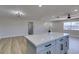 Spacious living room with modern light fixture at 4360 El Tovar Rd, Las Vegas, NV 89115