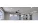 Bright living room with kitchen view showcases open floor plan and modern updates at 4360 El Tovar Rd, Las Vegas, NV 89115