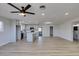 Living room with kitchen featuring an island and modern appliances with an open floor plan at 4360 El Tovar Rd, Las Vegas, NV 89115