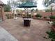 Paver patio featuring dining table and umbrella; perfect for outdoor gatherings and relaxing at 4361 Duck Harbor Ave, North Las Vegas, NV 89031