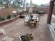 Paver patio with decorative glass table at 4361 Duck Harbor Ave, North Las Vegas, NV 89031