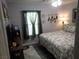 Cozy bedroom features soft bedding, natural light, and tasteful decor at 4361 Duck Harbor Ave, North Las Vegas, NV 89031