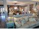 Living room boasts cozy seating, stylish decor, and seamless open-concept layout at 4361 Duck Harbor Ave, North Las Vegas, NV 89031