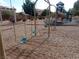 Community playground featuring swings and a slide, offering outdoor fun for children at 4361 Duck Harbor Ave, North Las Vegas, NV 89031