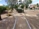 Scenic community walking path, perfect for a leisurely stroll or an active workout at 4361 Duck Harbor Ave, North Las Vegas, NV 89031