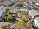 Community view featuring a pool, walking paths, mature landscaping and neighborhood townhomes at 4465 Shimmering Skies St # 1177, North Las Vegas, NV 89031