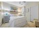 Cozy bedroom with a comfortable bed, neutral decor, and plenty of natural light at 4465 Shimmering Skies St # 1177, North Las Vegas, NV 89031