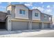 Charming townhome with well-maintained landscaping and attached garages at 4465 Shimmering Skies St # 1177, North Las Vegas, NV 89031
