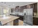 Well-equipped kitchen boasts granite countertops and stainless steel appliances at 4465 Shimmering Skies St # 1177, North Las Vegas, NV 89031