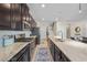 Stylish kitchen with granite countertops and a gas range stove at 4465 Shimmering Skies St # 1177, North Las Vegas, NV 89031