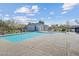 Community pool featuring crystal clear water, a spacious deck, and ample seating at 4465 Shimmering Skies St # 1177, North Las Vegas, NV 89031