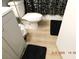 Standard bathroom with a toilet, vanity and Paris themed shower curtain at 4663 Sand Creek Ave, Las Vegas, NV 89103