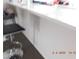 Spacious kitchen featuring barstool seating with a long counter and cabinets at 4663 Sand Creek Ave, Las Vegas, NV 89103