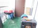 Enclosed patio features artificial turf and a grill, offering a cozy outdoor space at 4663 Sand Creek Ave, Las Vegas, NV 89103