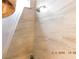 Modern bathroom features a shower with white stone-look tile surround at 4663 Sand Creek Ave, Las Vegas, NV 89103
