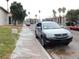 Exterior view of the community streets, with vehicles parked along the side at 4663 Sand Creek Ave, Las Vegas, NV 89103